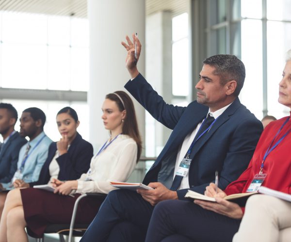 side-view-of-diverse-business-people-attending-a-b-BDQUZGN-scaled.jpg